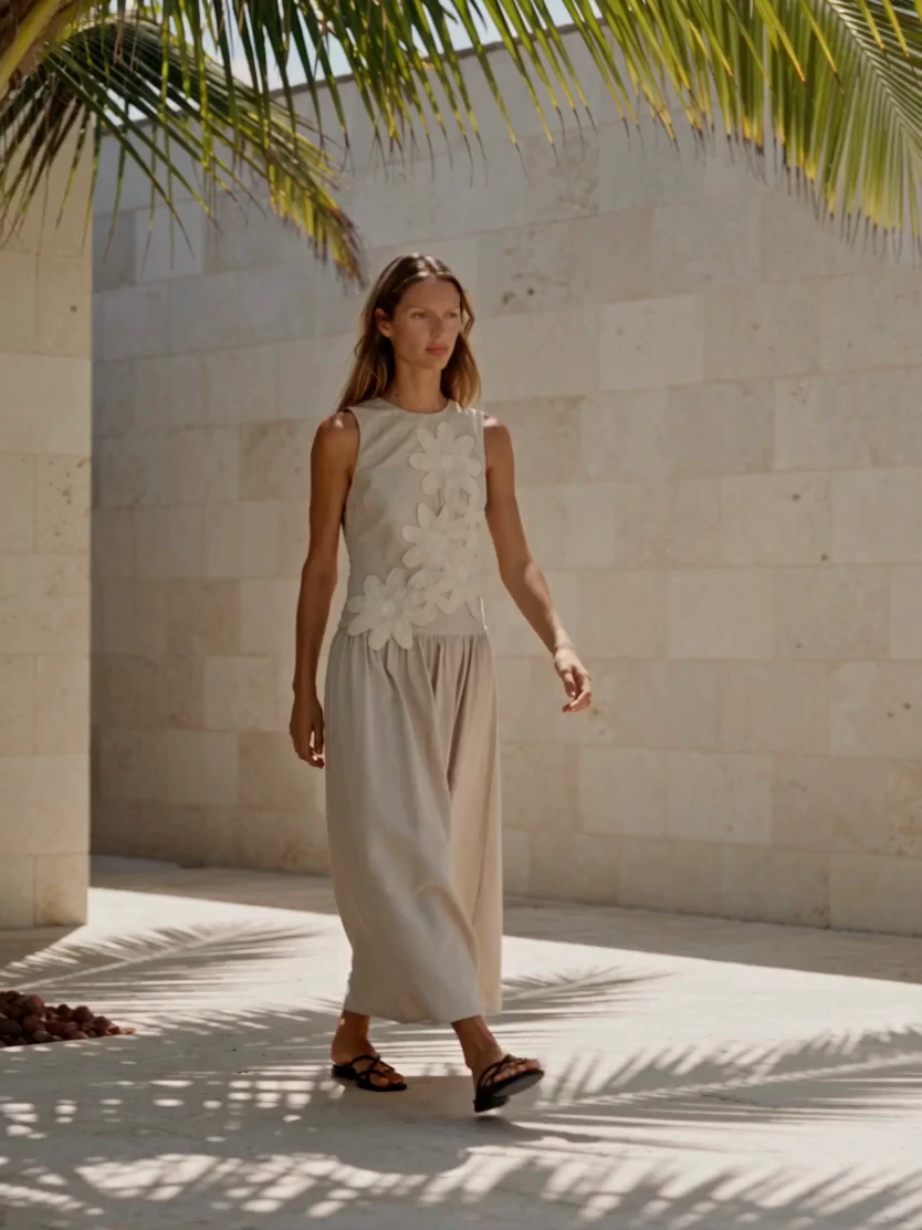 AI-styled walking model wearing Gala catalog garments