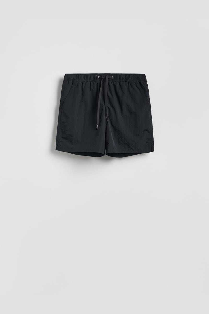 Reserved Plain beach shorts in Black